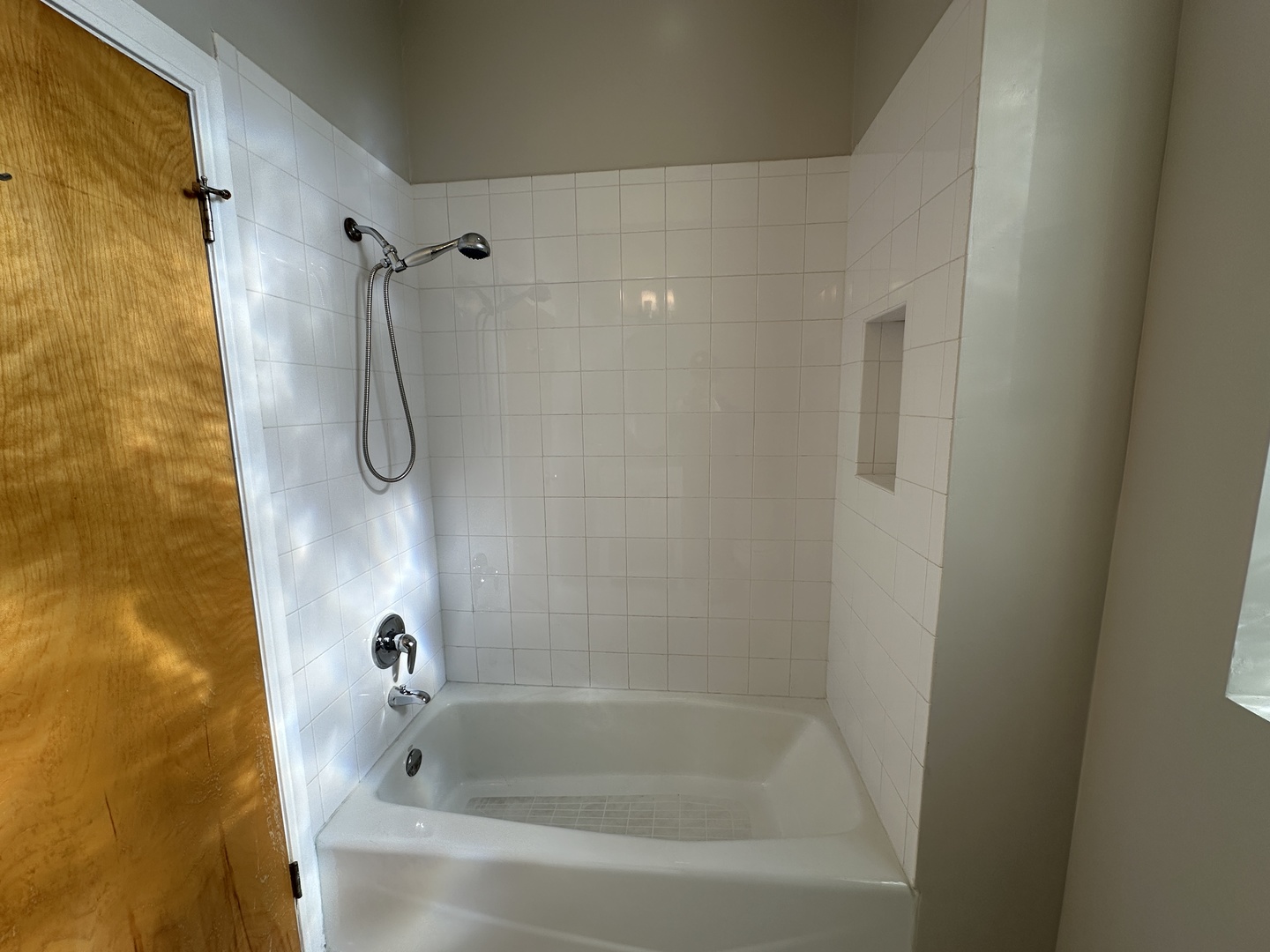 3946 North Cicero Avenue, Unit 1 Chicago, IL 60641 - Photo 7 of 17 a close view of a bathtub in bathroom