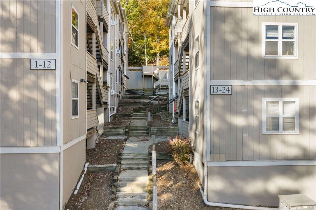 229 East King Street, Unit 17 Boone, NC 28607 - Photo 18 of 22 a view of a glass door with a yard