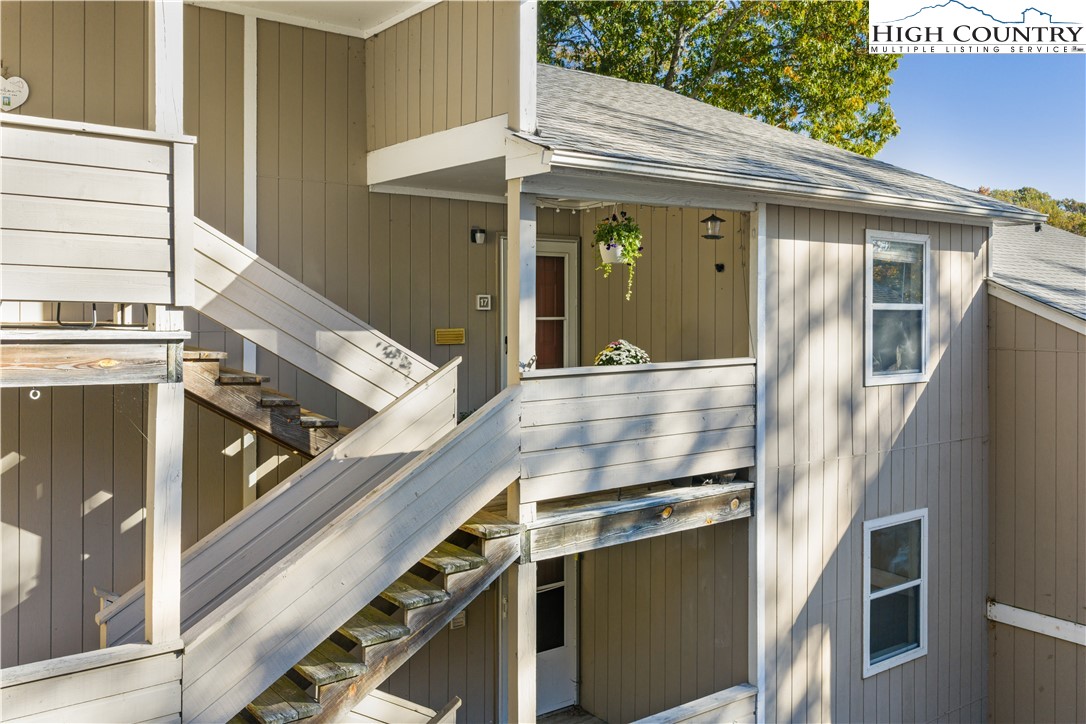 229 East King Street, Unit 17 Boone, NC 28607 - Photo 2 of 22 a kitchen with a refrigerator and countertop