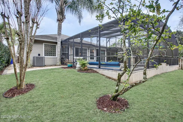 a house with garden in front of it