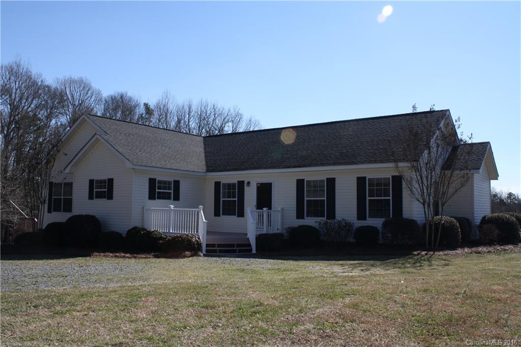 10866 Barberville Road Indian Land, SC 29707 - Photo 2 of 20 a house that has a tree in front of it