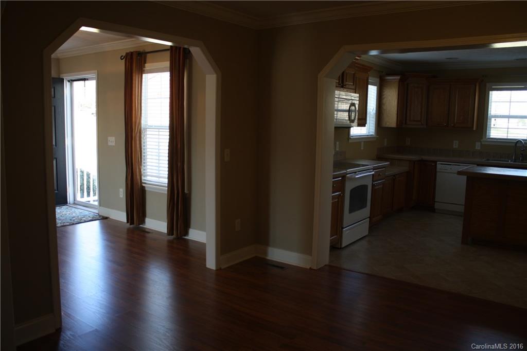 10866 Barberville Road Indian Land, SC 29707 - Photo 11 of 20 an empty room with wooden floor and windows