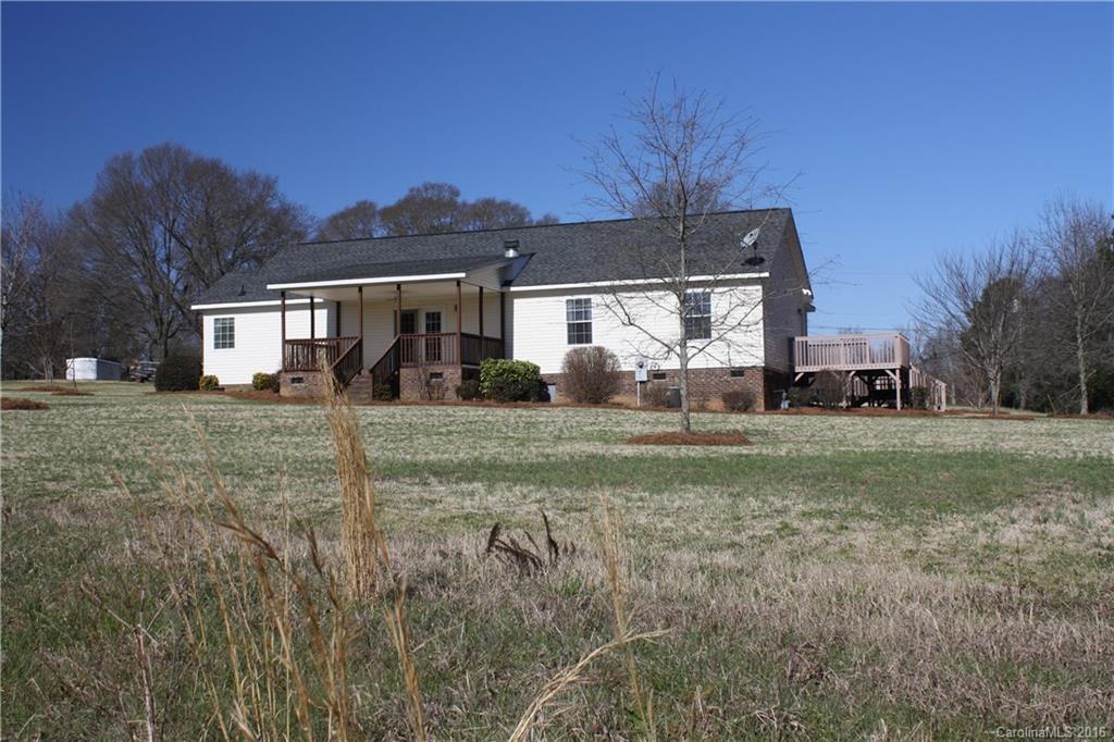 10866 Barberville Road Indian Land, SC 29707 - Photo 3 of 20 a view of a house with a yard