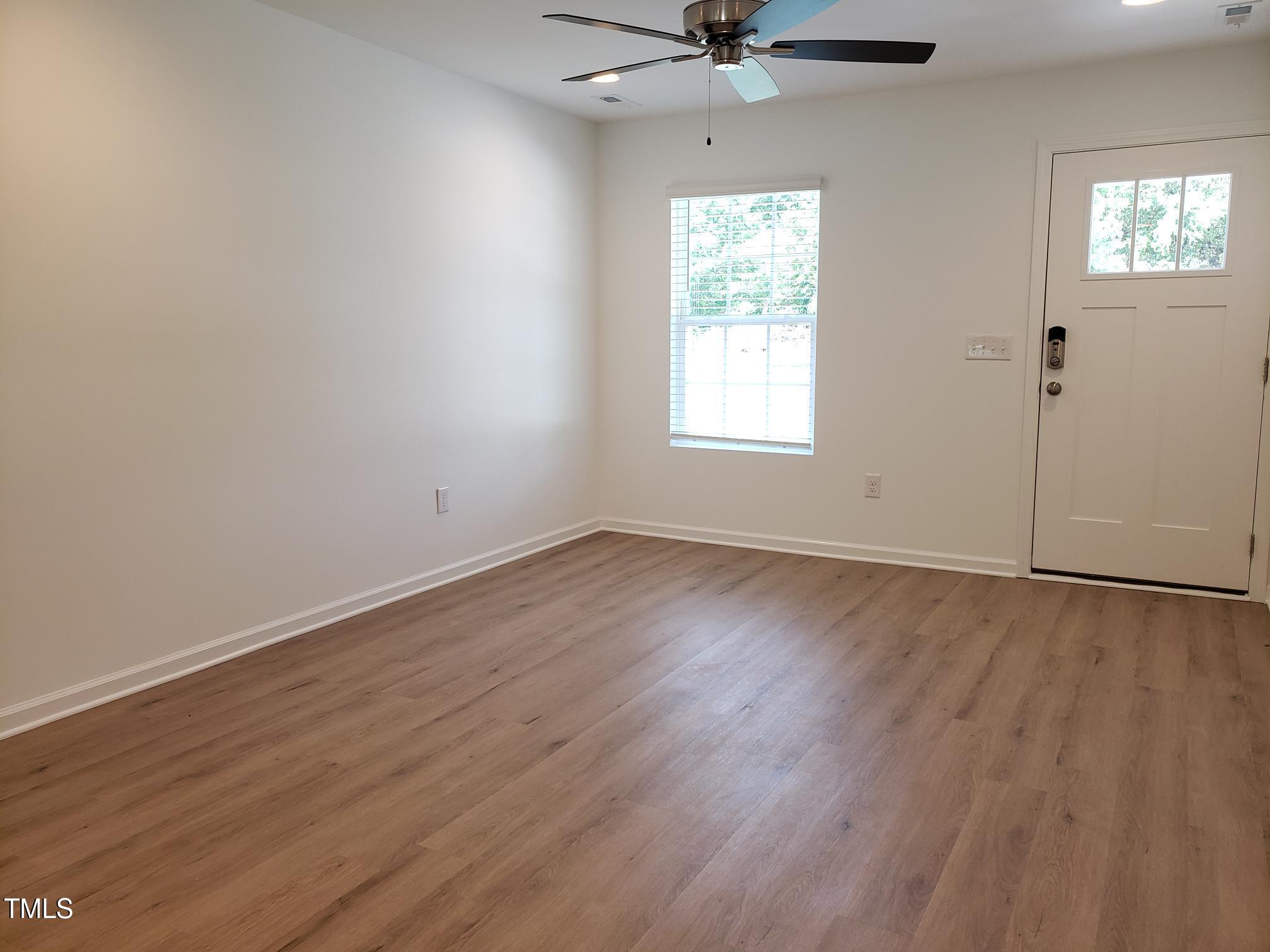 207 South Nash Street, Unit A Bunn, NC 27508 - Photo 2 of 11 20240511_100904