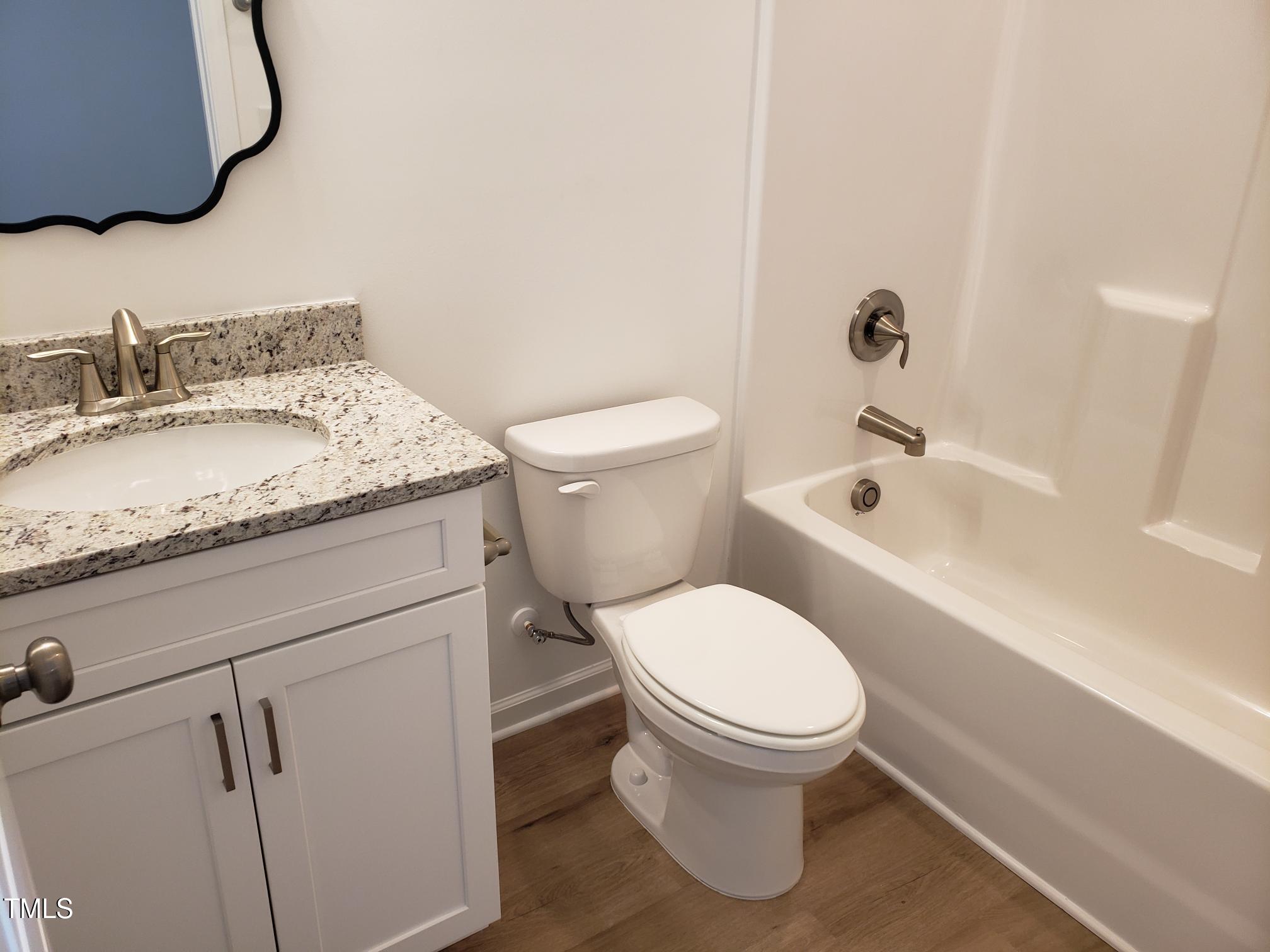 207 South Nash Street, Unit A Bunn, NC 27508 - Photo 4 of 11 20240511_101056