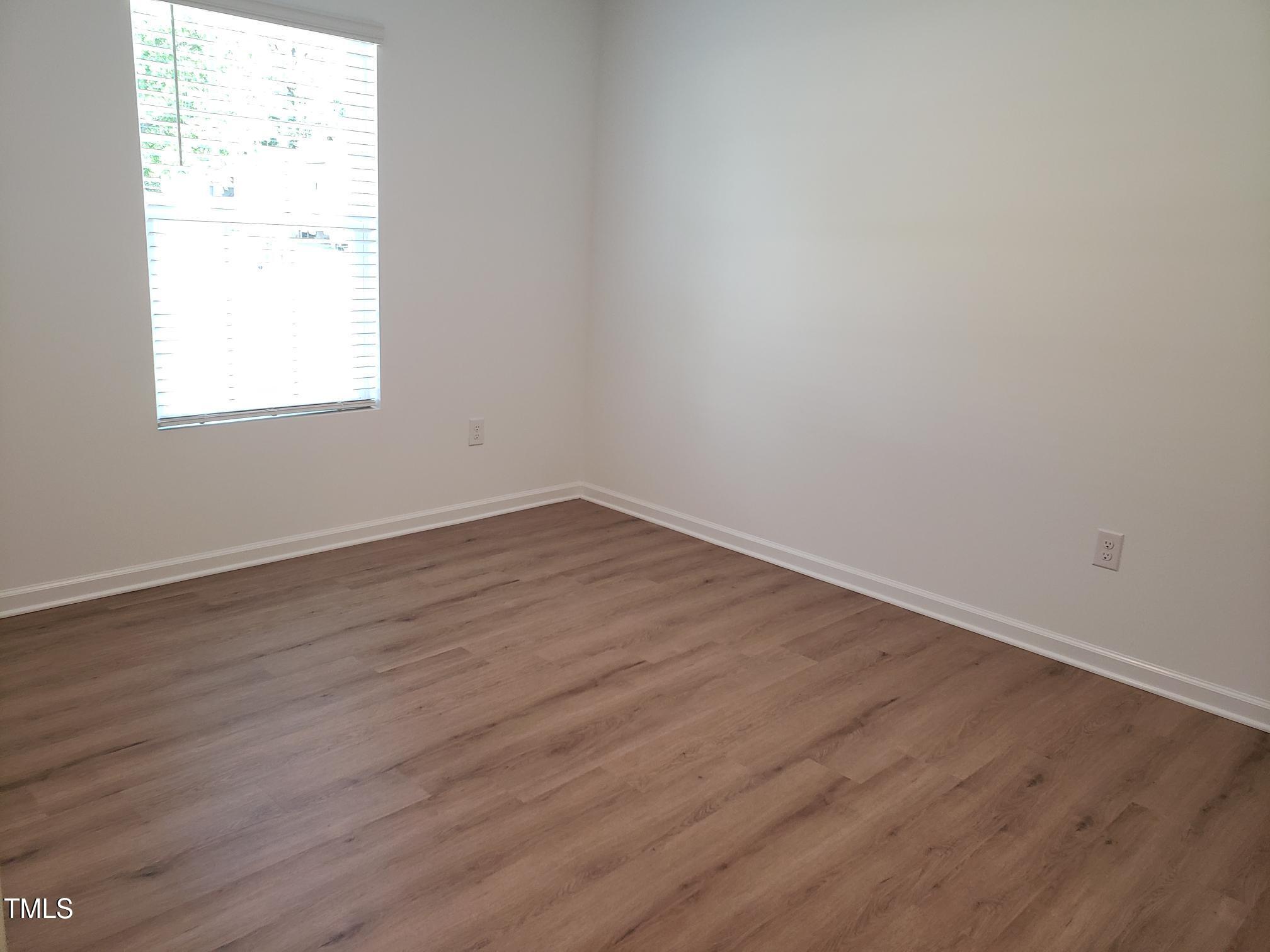 207 South Nash Street, Unit A Bunn, NC 27508 - Photo 7 of 11 20240511_101125