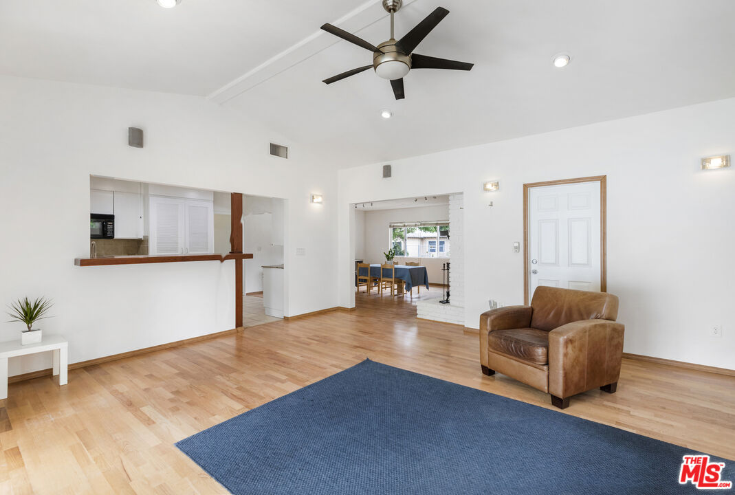 7716 Thousand Oaks Drive Tujunga, CA 91042 - Photo 12 of 34 a living room with furniture and a couch