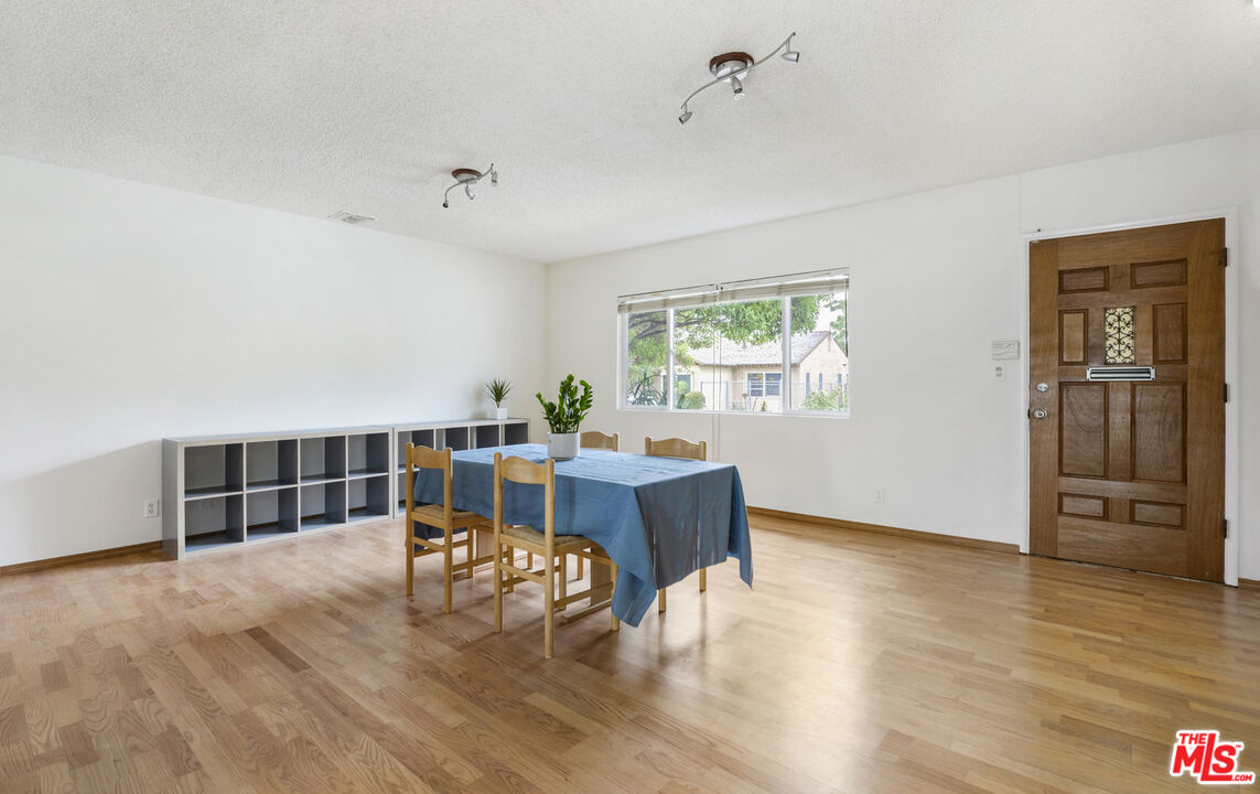 7716 Thousand Oaks Drive Tujunga, CA 91042 - Photo 5 of 34 a living room with furniture window and wooden floor