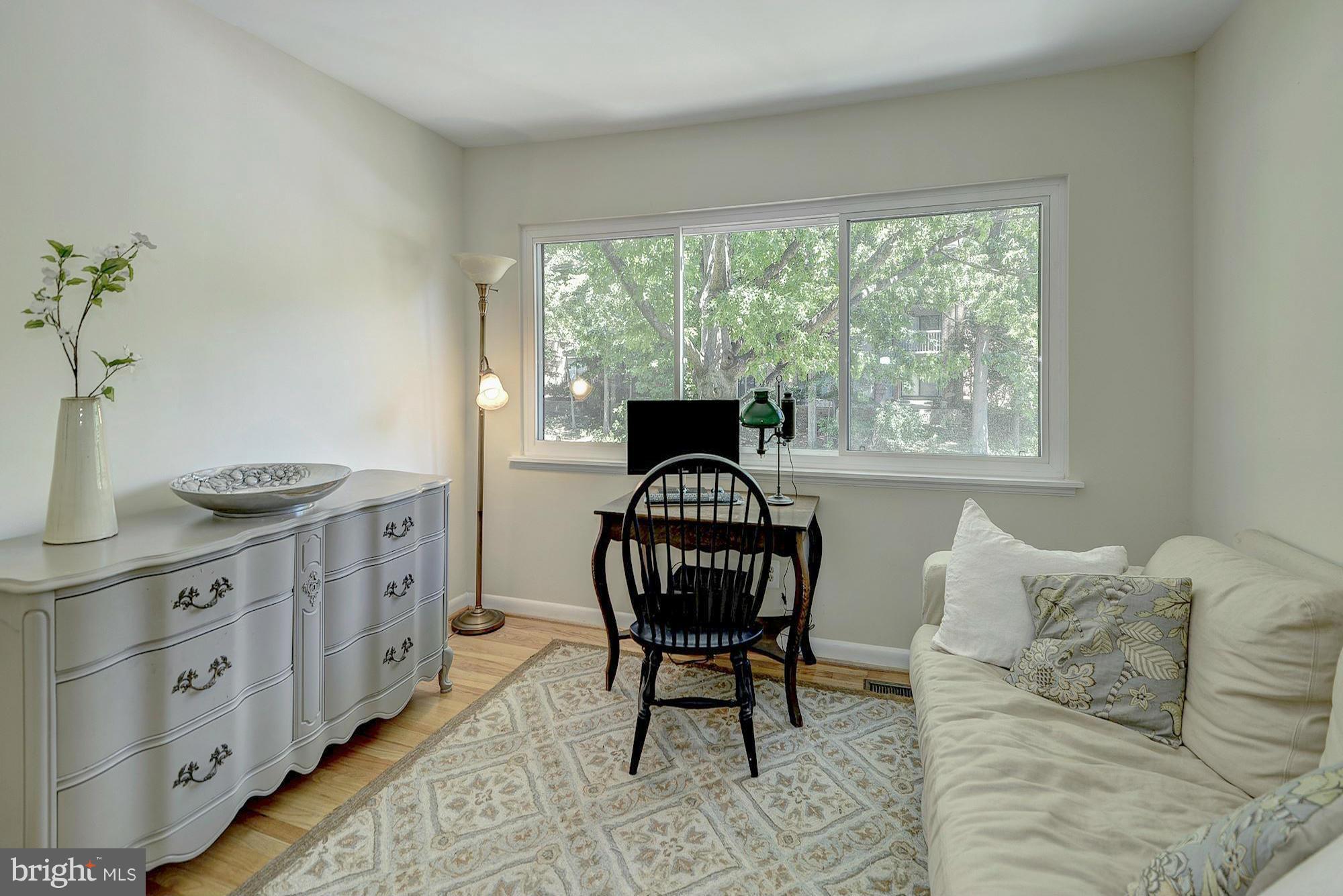 1620 Waters Edge Lane Reston, VA 20190 - Photo 24 of 30 a living room with furniture and a window