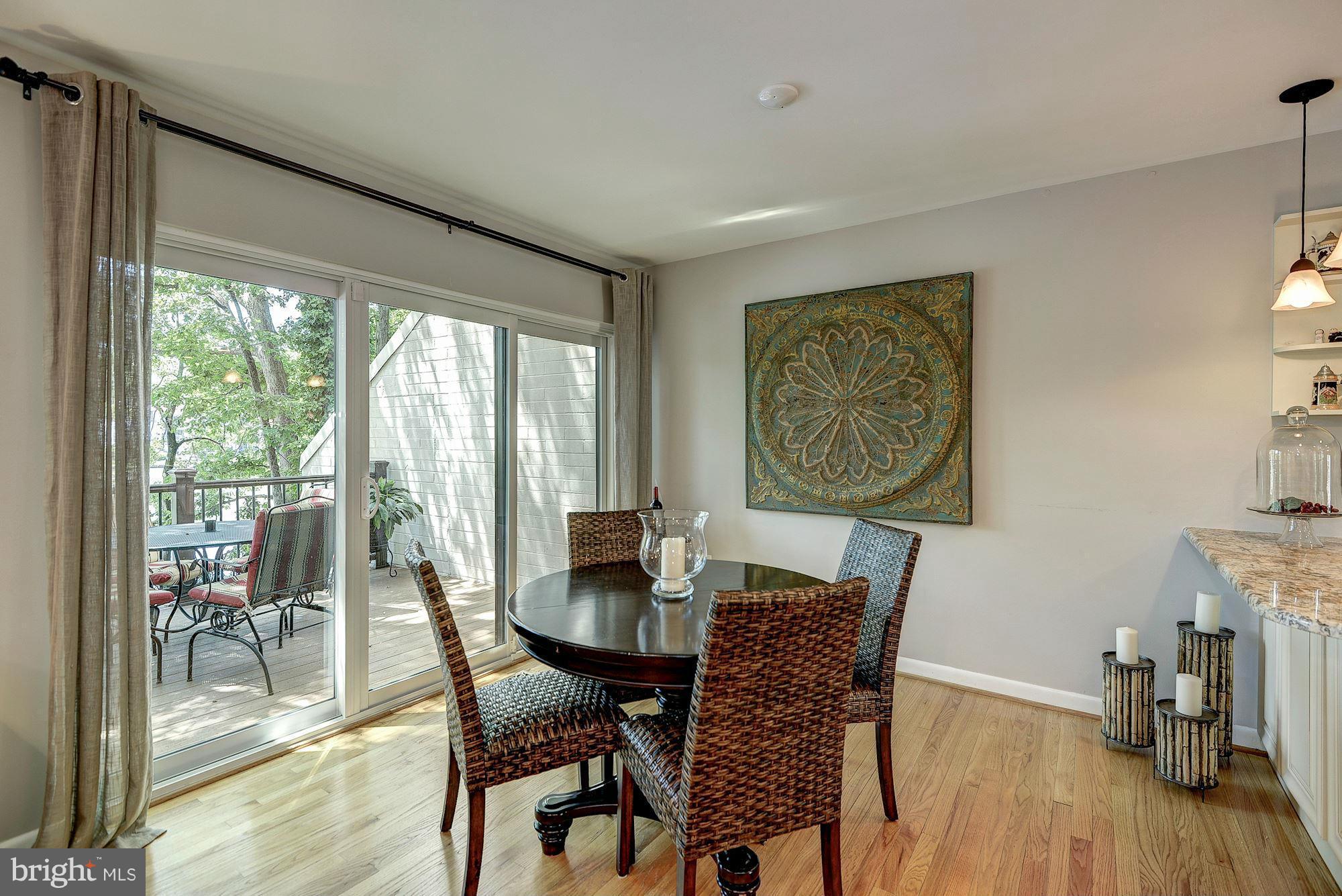 1620 Waters Edge Lane Reston, VA 20190 - Photo 8 of 30 a dining room with furniture and wooden floor