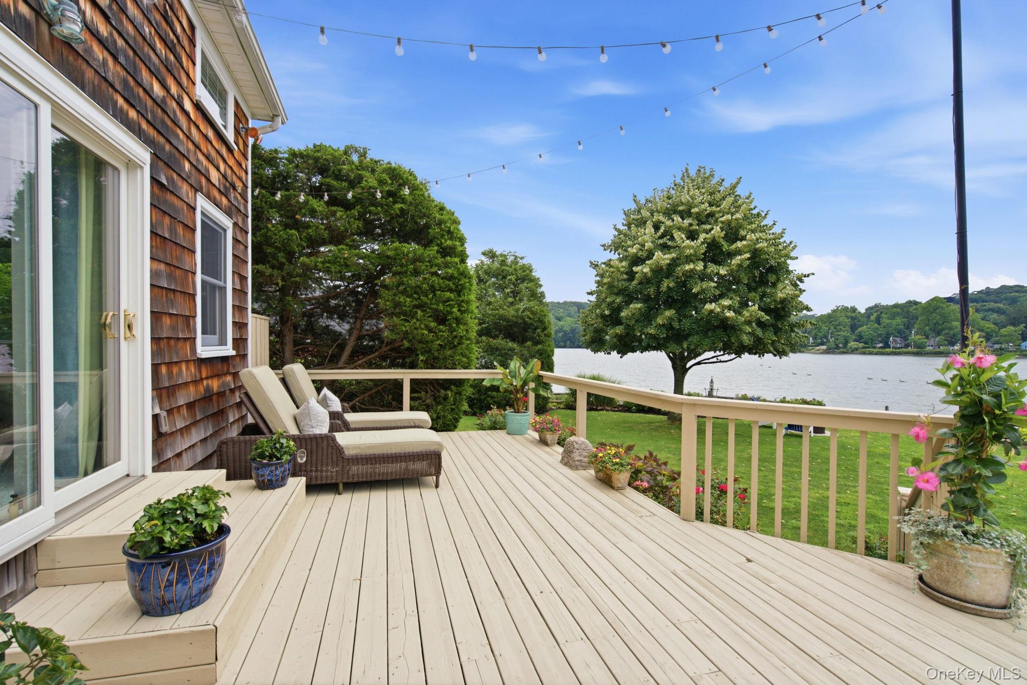 33 Prospect Road Centerport, NY 11721 - Photo 39 of 48 Lounge on the deck overlooking the water.