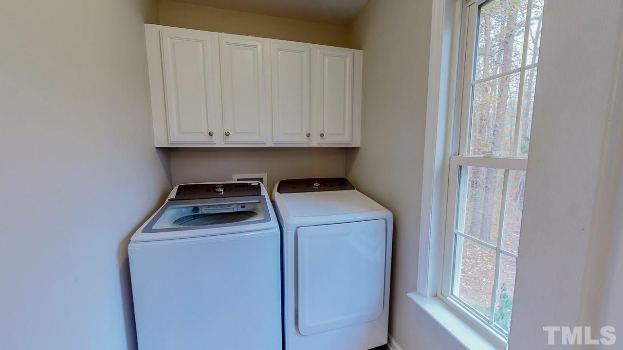 342 Punch Hill Farm Road Rougemont, NC 27572 - Photo 24 of 30 a utility room with dryer and washer