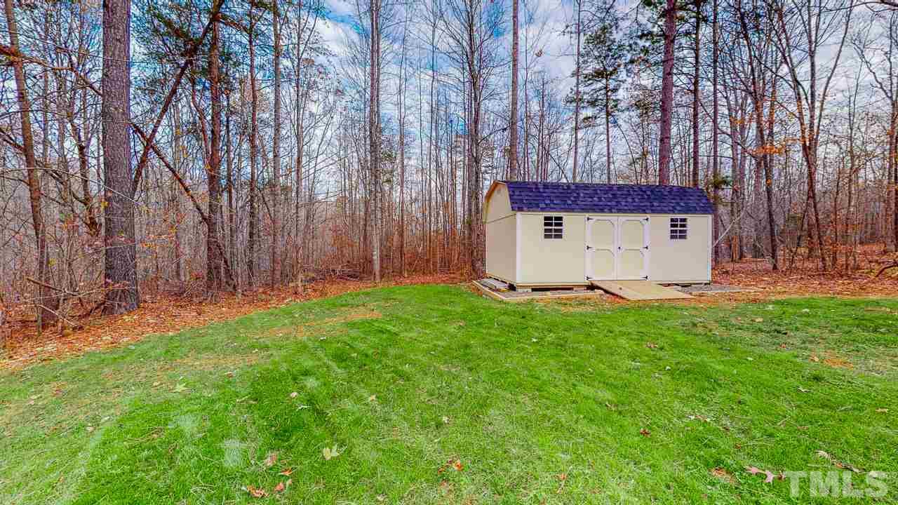 342 Punch Hill Farm Road Rougemont, NC 27572 - Photo 28 of 30 a front view of a house with garden