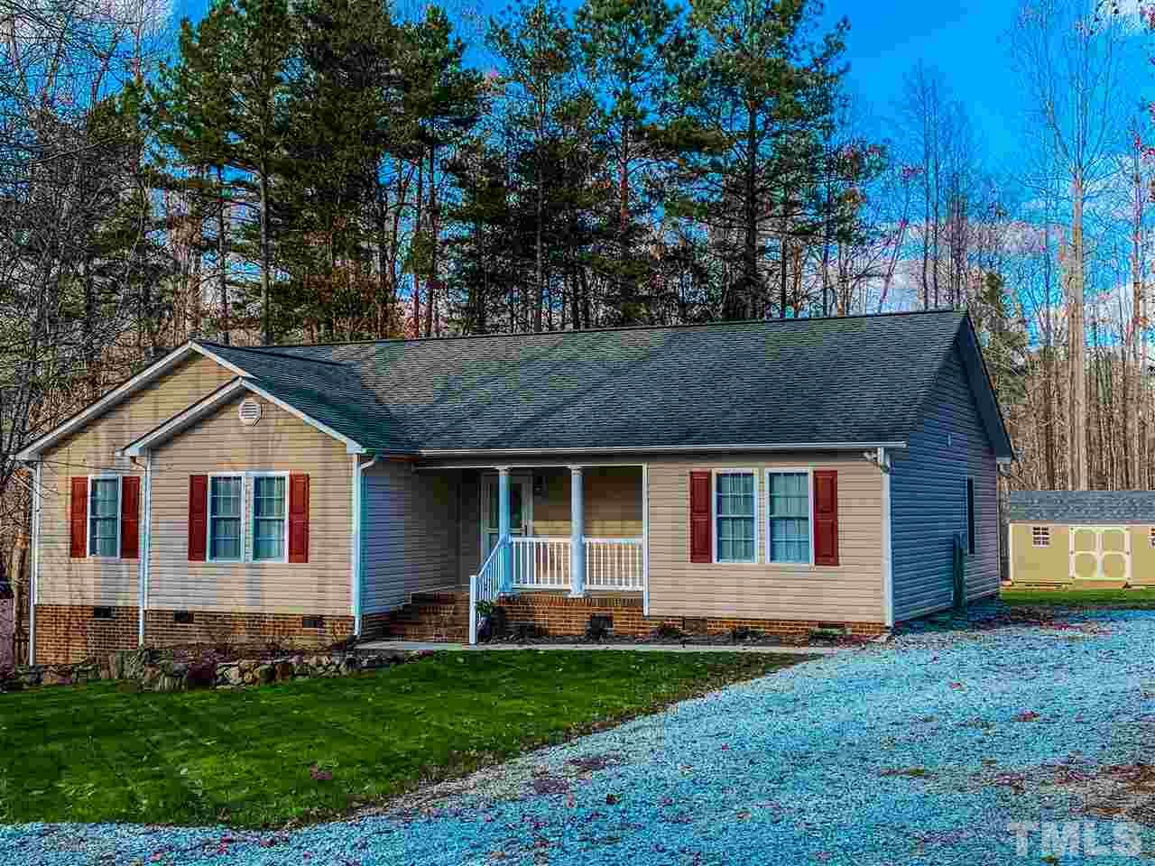 342 Punch Hill Farm Road Rougemont, NC 27572 - Photo 29 of 30 a front view of a house with a garden