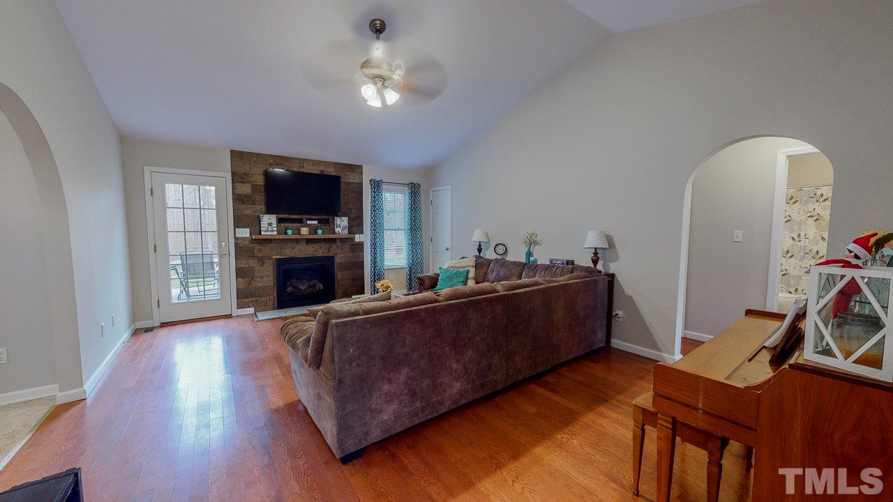 342 Punch Hill Farm Road Rougemont, NC 27572 - Photo 5 of 30 a living room with furniture and a flat screen tv
