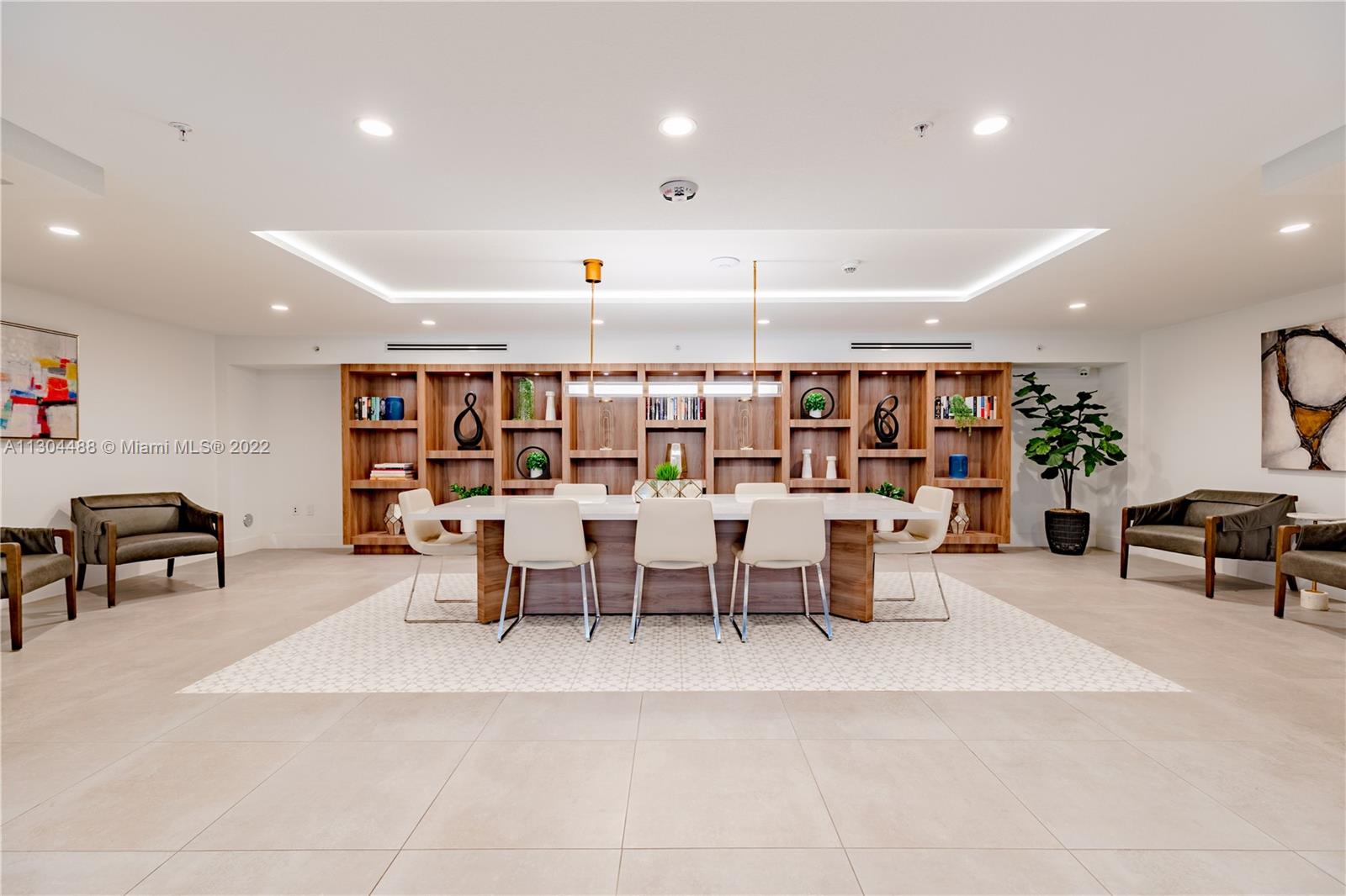 1950 West 49th Street, Unit 213 Hialeah, FL 33012 - Photo 14 of 49 a group of people sitting in a room