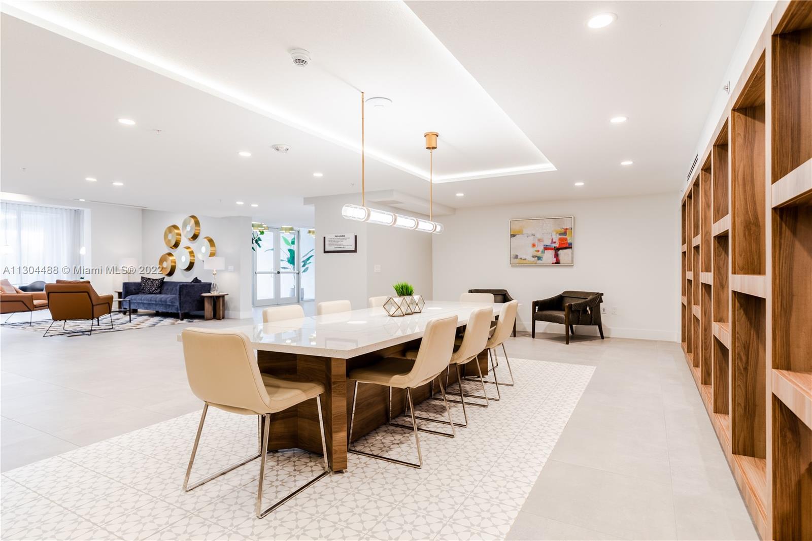 1950 West 49th Street, Unit 213 Hialeah, FL 33012 - Photo 17 of 49 a kitchen with a table and chairs