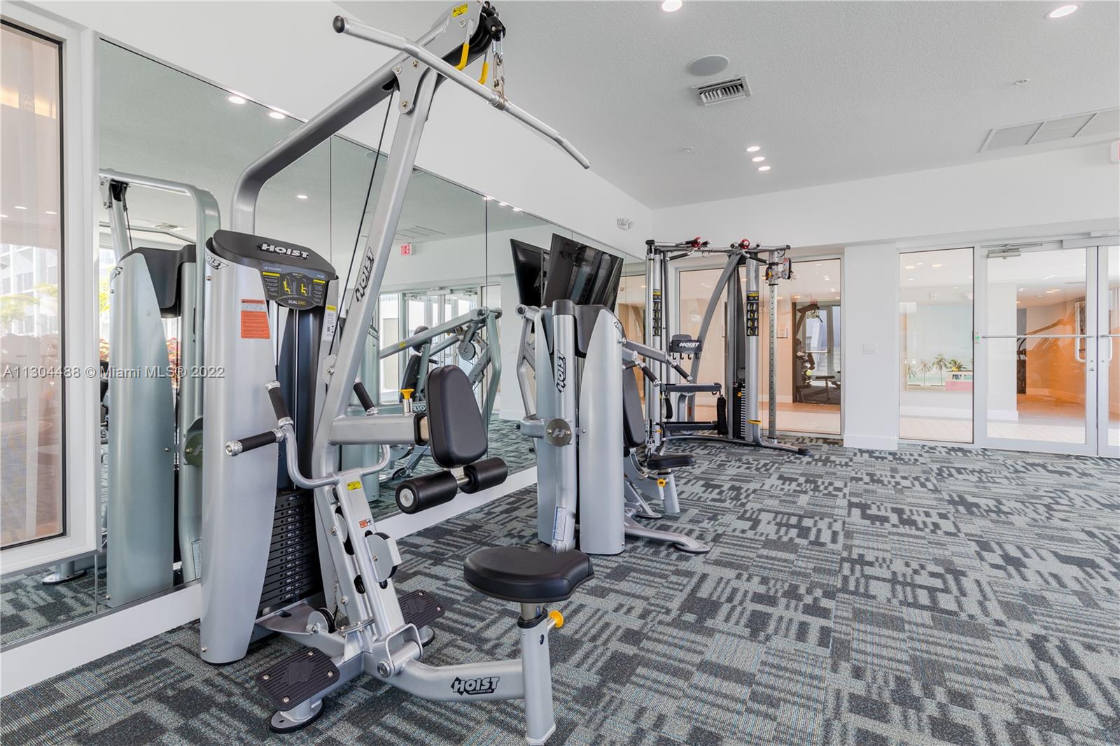 1950 West 49th Street, Unit 213 Hialeah, FL 33012 - Photo 48 of 49 a view of a room with gym equipment