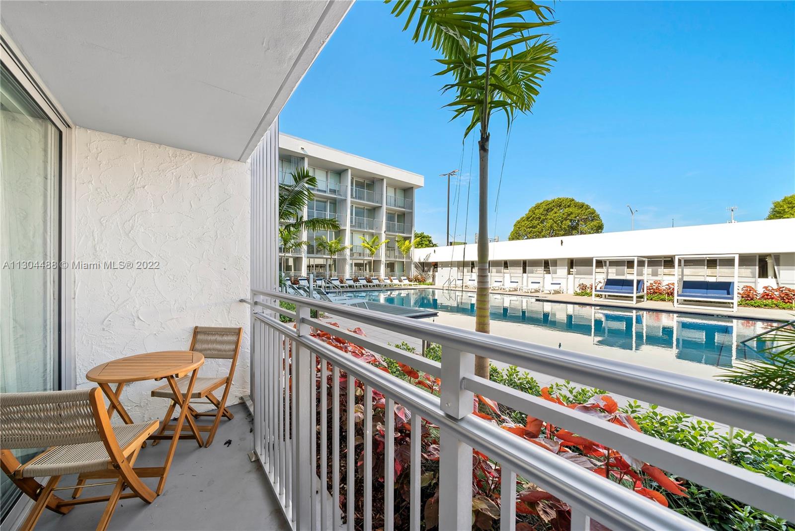 1950 West 49th Street, Unit 213 Hialeah, FL 33012 - Photo 10 of 49 a view of a balcony with chairs