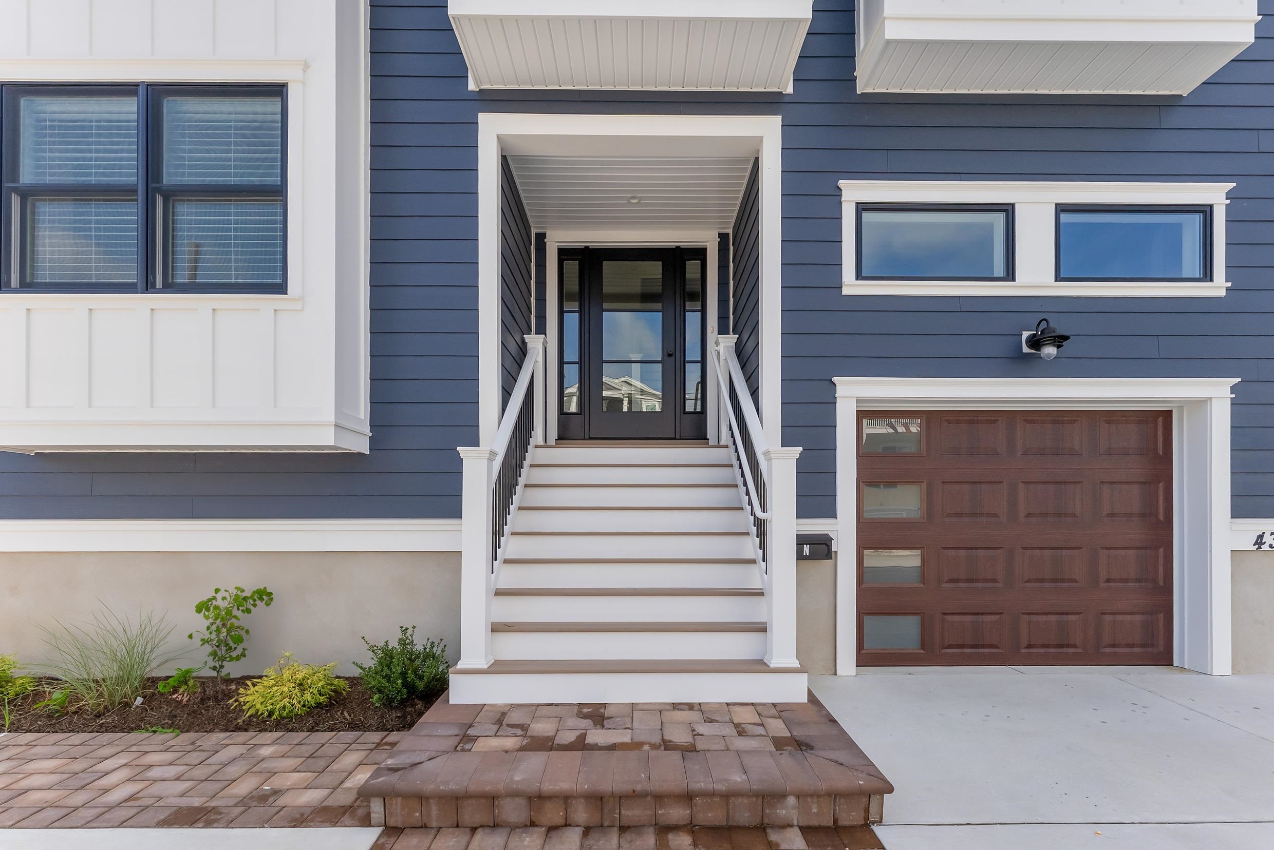 4301 Central, Unit NORTH Sea Isle City, NJ 08243 - Photo 2 of 47 front view of a house with a window