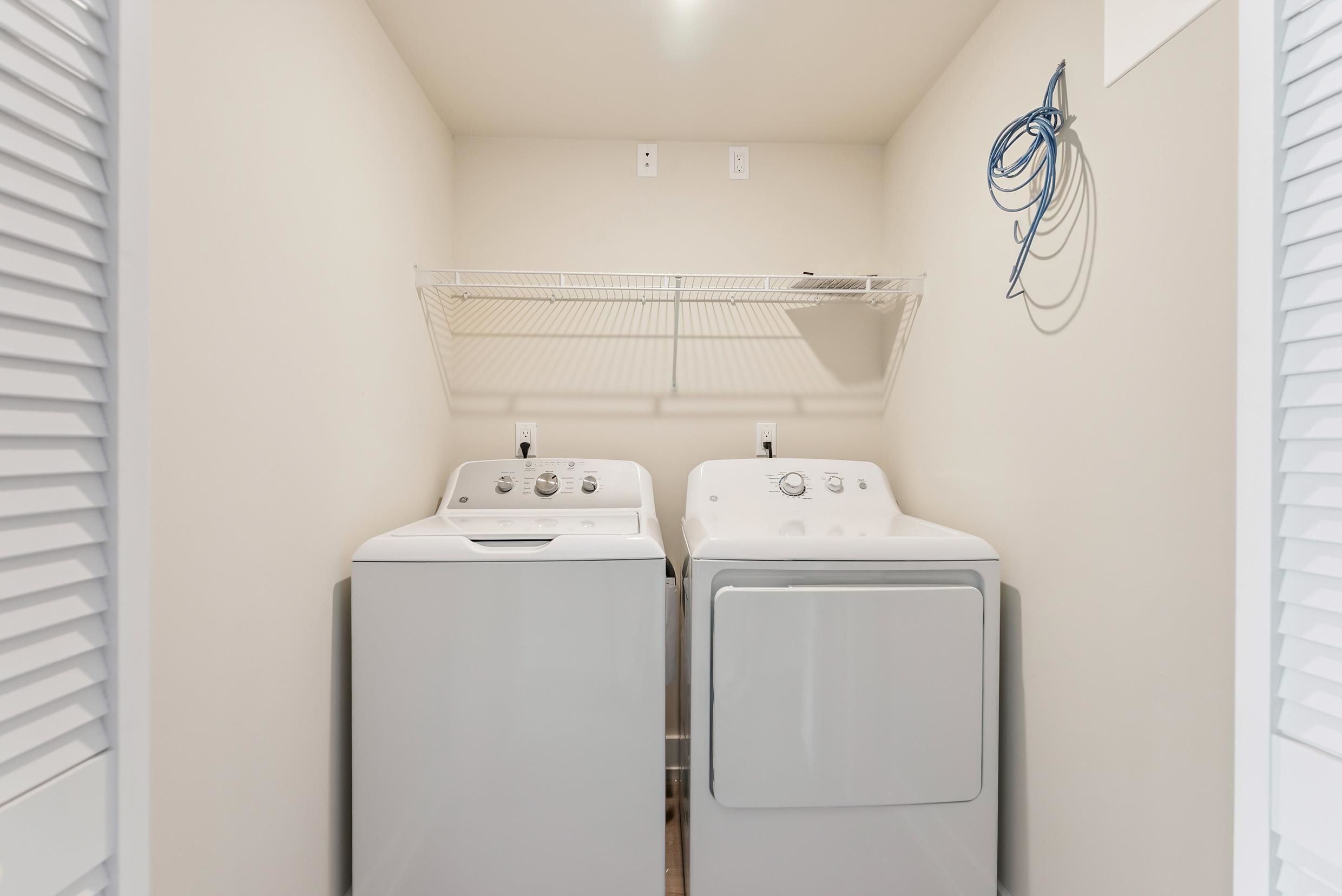 4301 Central, Unit NORTH Sea Isle City, NJ 08243 - Photo 42 of 47 a utility room with dryer and washer