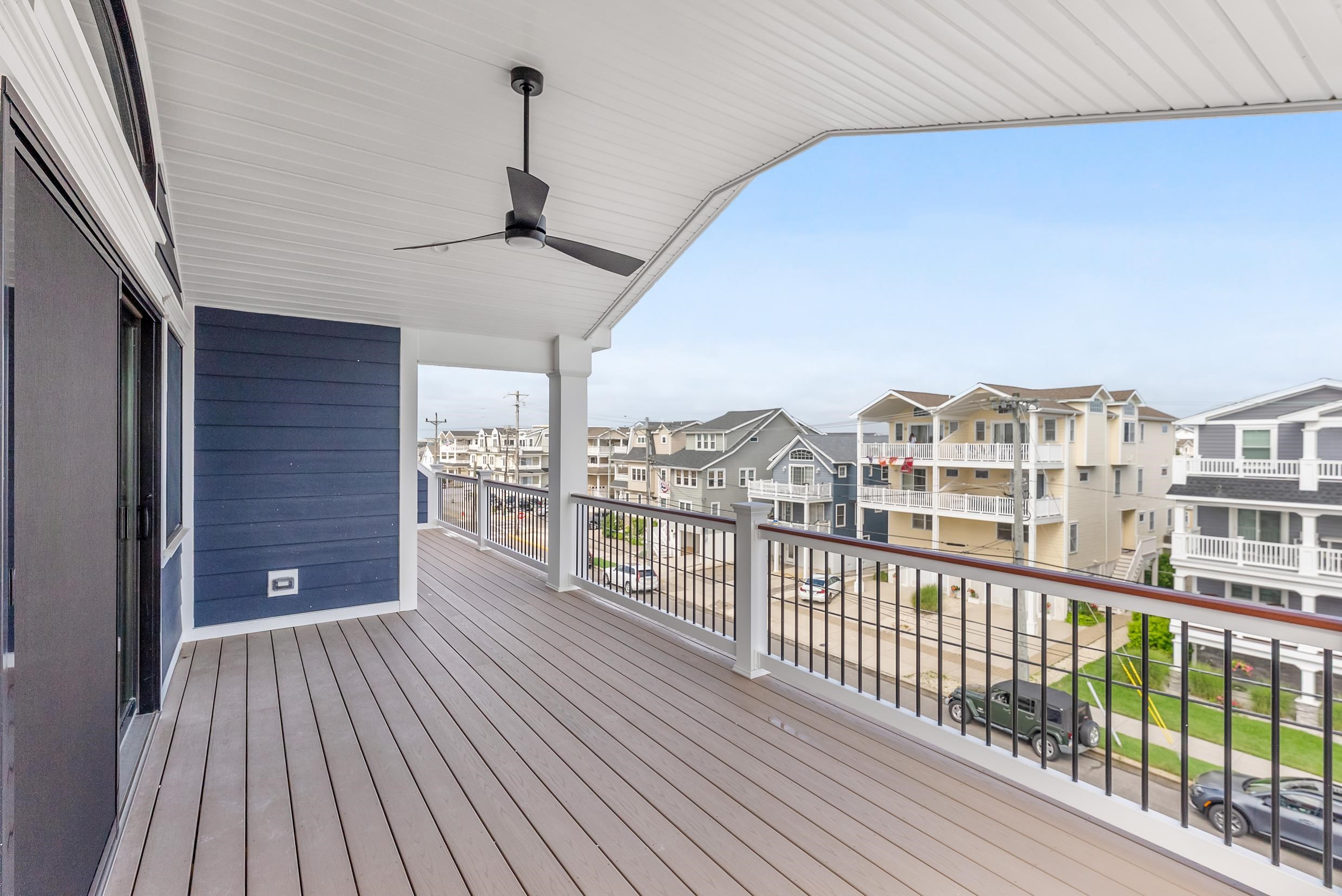4301 Central, Unit NORTH Sea Isle City, NJ 08243 - Photo 45 of 47 a view of a balcony with wooden floor