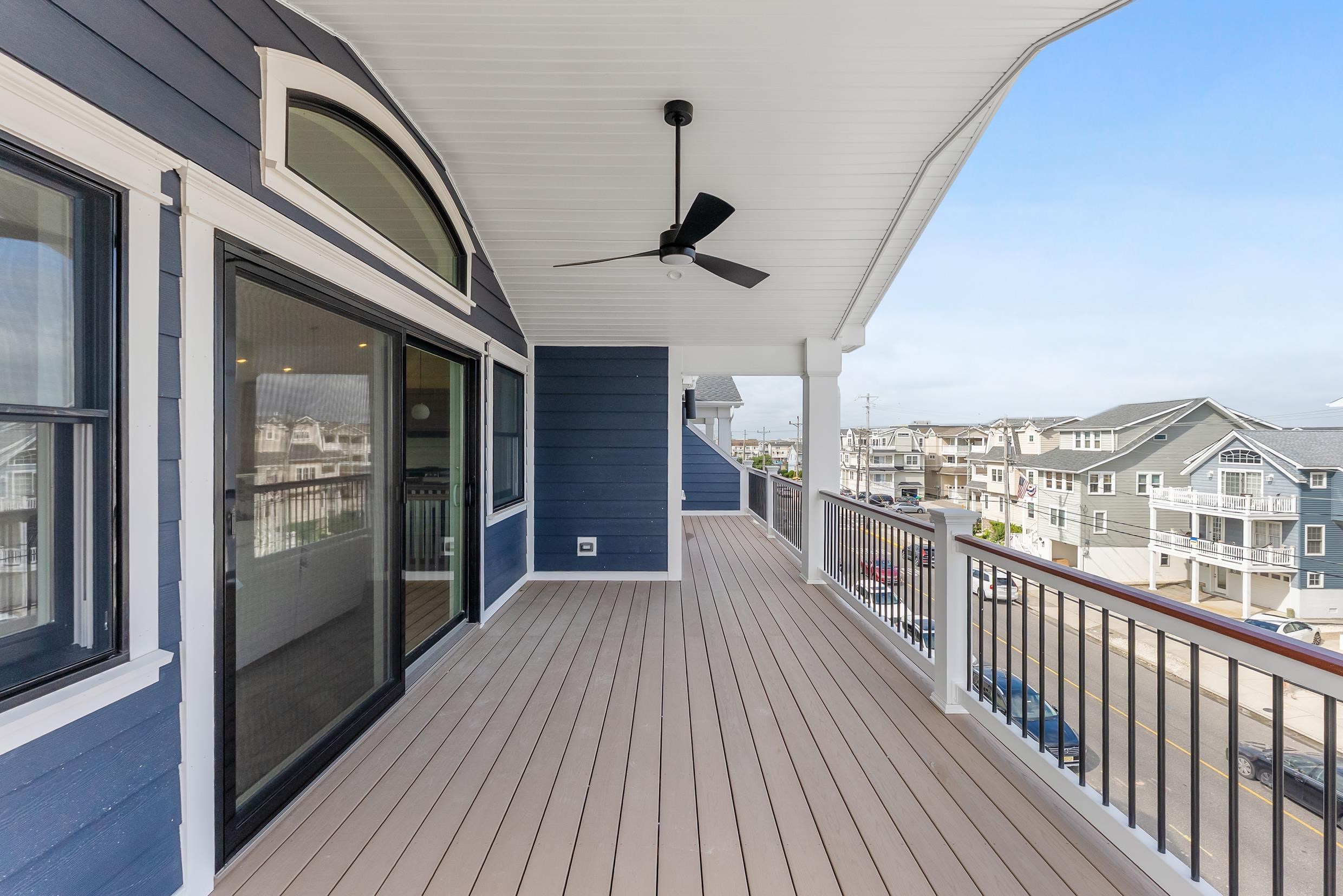 4301 Central, Unit NORTH Sea Isle City, NJ 08243 - Photo 46 of 47 a view of a balcony with wooden floor
