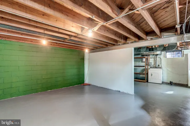 a view of a room with washing machine