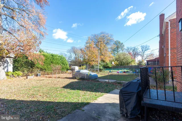 a view of a yard with patio