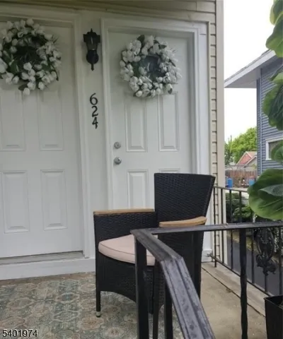 a view of a workspace with furniture