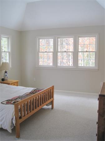 728 Burroughs Road Boxborough, MA 01719 - Photo 11 of 21 a bed sitting in a bedroom next to a window