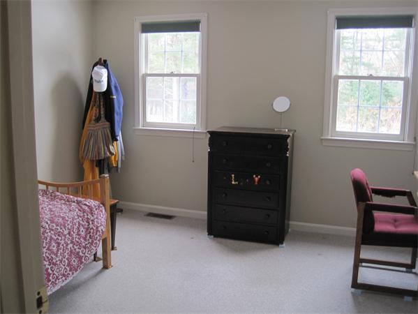 728 Burroughs Road Boxborough, MA 01719 - Photo 13 of 21 a living room with furniture and a window