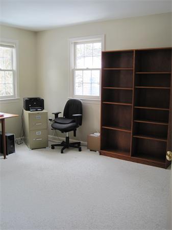 728 Burroughs Road Boxborough, MA 01719 - Photo 14 of 21 a living room with furniture and a window