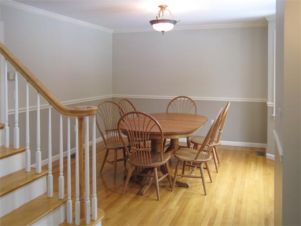 728 Burroughs Road Boxborough, MA 01719 - Photo 4 of 21 a view of a dining room with furniture and wooden floor