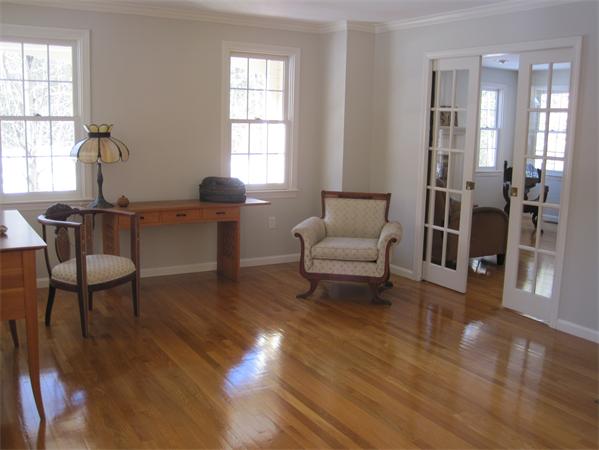 728 Burroughs Road Boxborough, MA 01719 - Photo 6 of 21 a living room with furniture a window and wooden floor