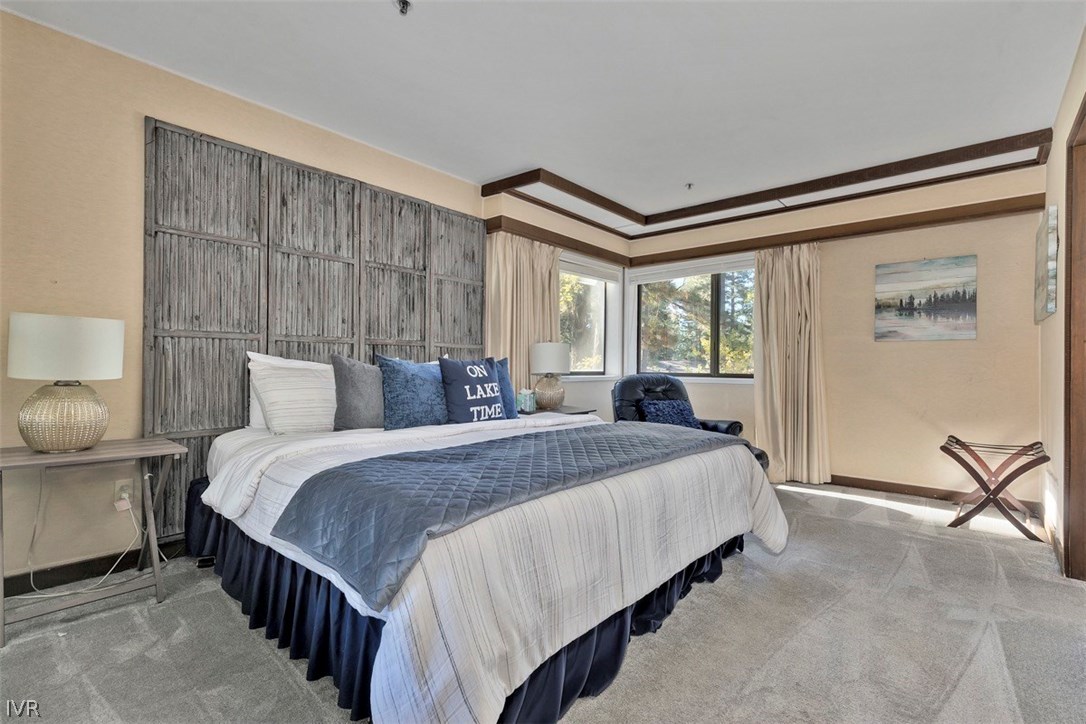 333 Ski Way, Unit 277 Incline Village, NV 89451 - Photo 12 of 33 a bed room with a bed and a lamp