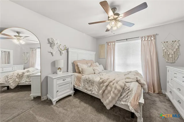 a large bathroom with kitchen island granite countertop a large counter top and sink