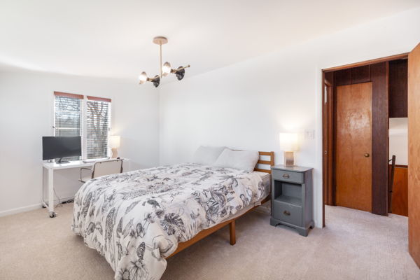 51 Wilcox Avenue Elgin, IL 60123 - Photo 13 of 20 a bedroom with a bed and a tv