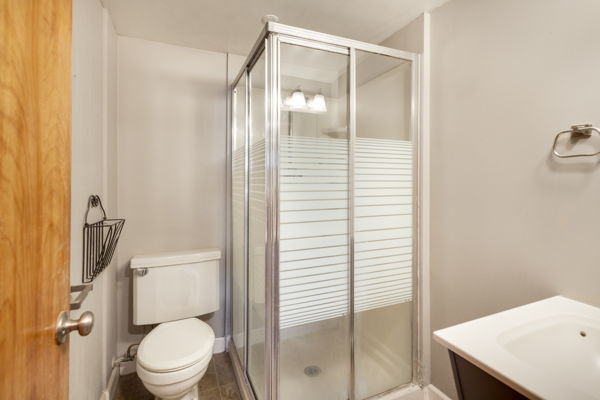 51 Wilcox Avenue Elgin, IL 60123 - Photo 15 of 20 a bathroom with a shower and a toilet