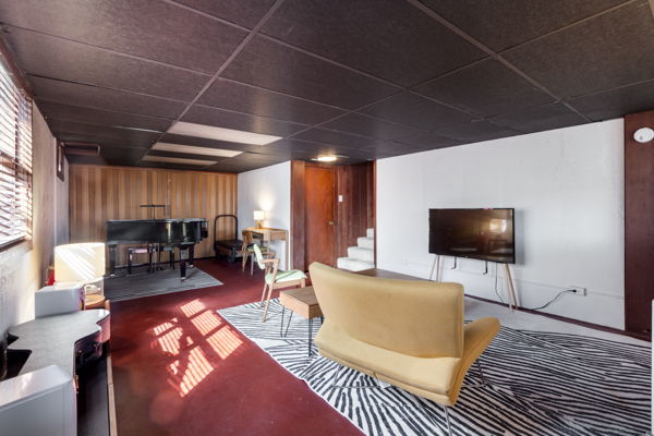 51 Wilcox Avenue Elgin, IL 60123 - Photo 17 of 20 a living room with furniture and a flat screen tv