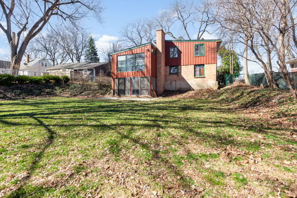 51 Wilcox Avenue Elgin, IL 60123 - Photo 20 of 20 a front view of a house with a yard table and chairs