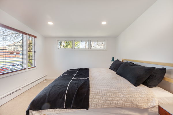 51 Wilcox Avenue Elgin, IL 60123 - Photo 10 of 20 a bedroom with a bed window and window