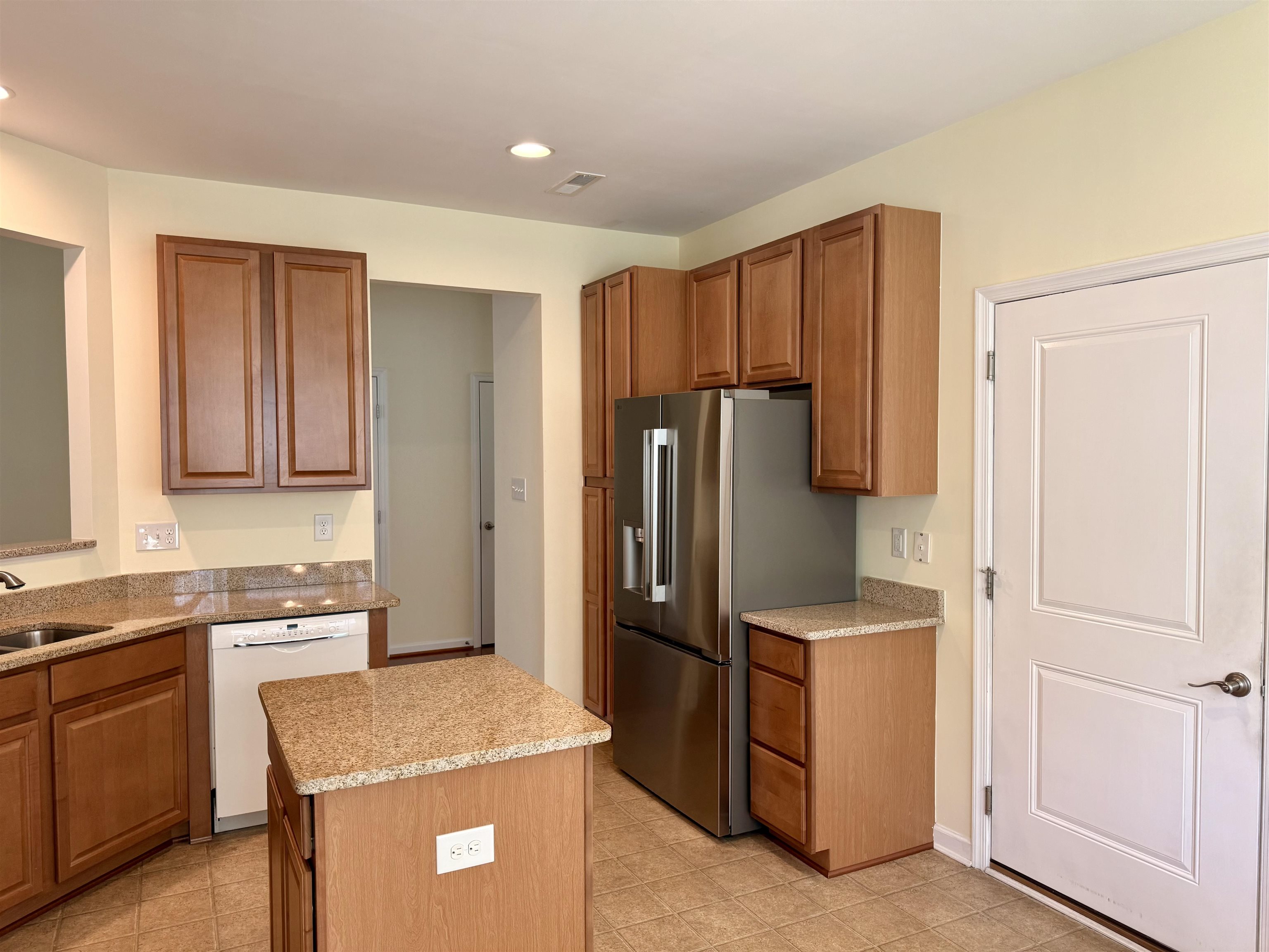 1607 Tidewater Avenue, Unit 1607 Rio Grande, NJ 08242 - Photo 11 of 42 a kitchen with stainless steel appliances granite countertop a refrigerator and a stove