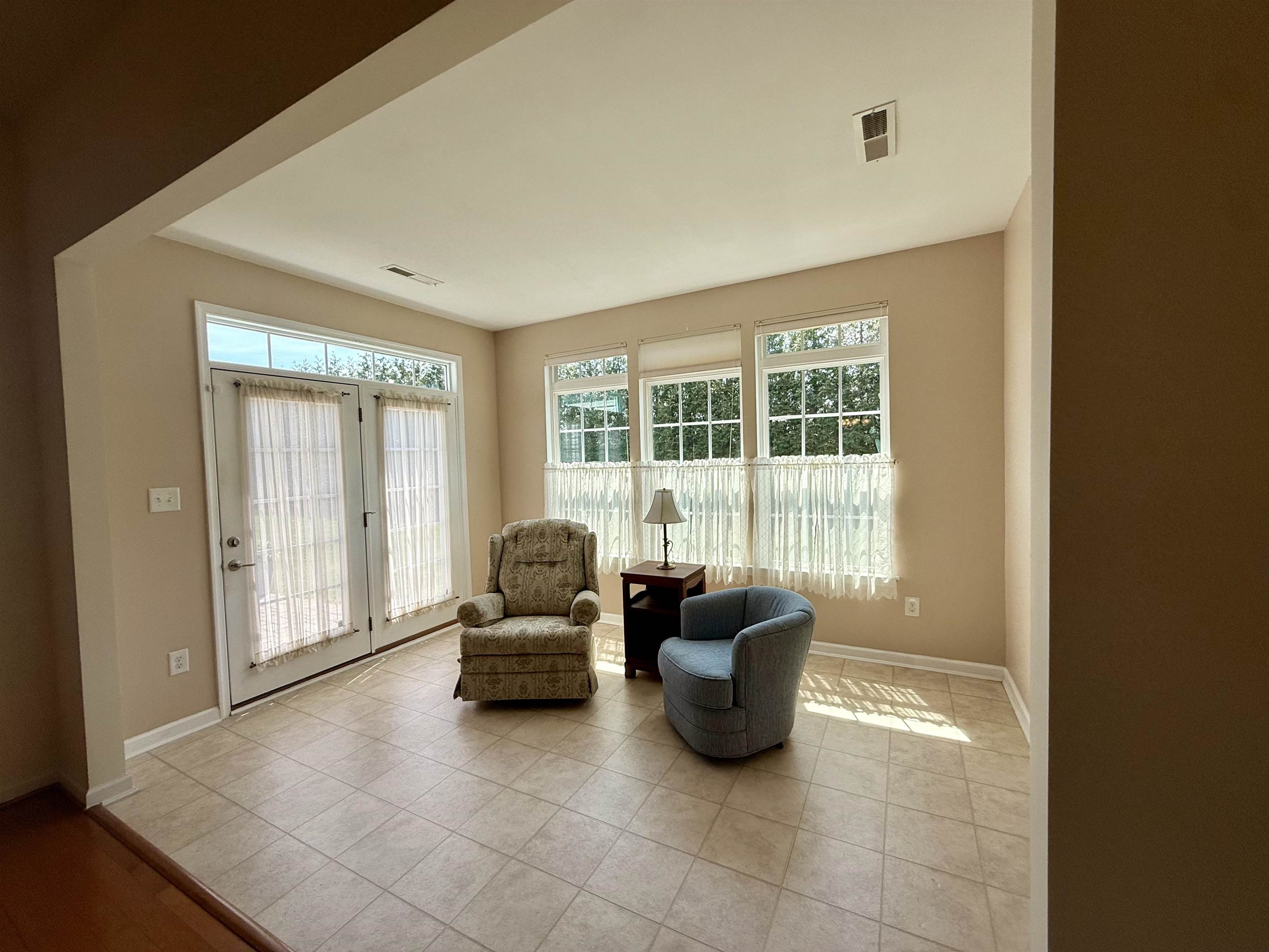 1607 Tidewater Avenue, Unit 1607 Rio Grande, NJ 08242 - Photo 14 of 42 a living room with furniture and large windows