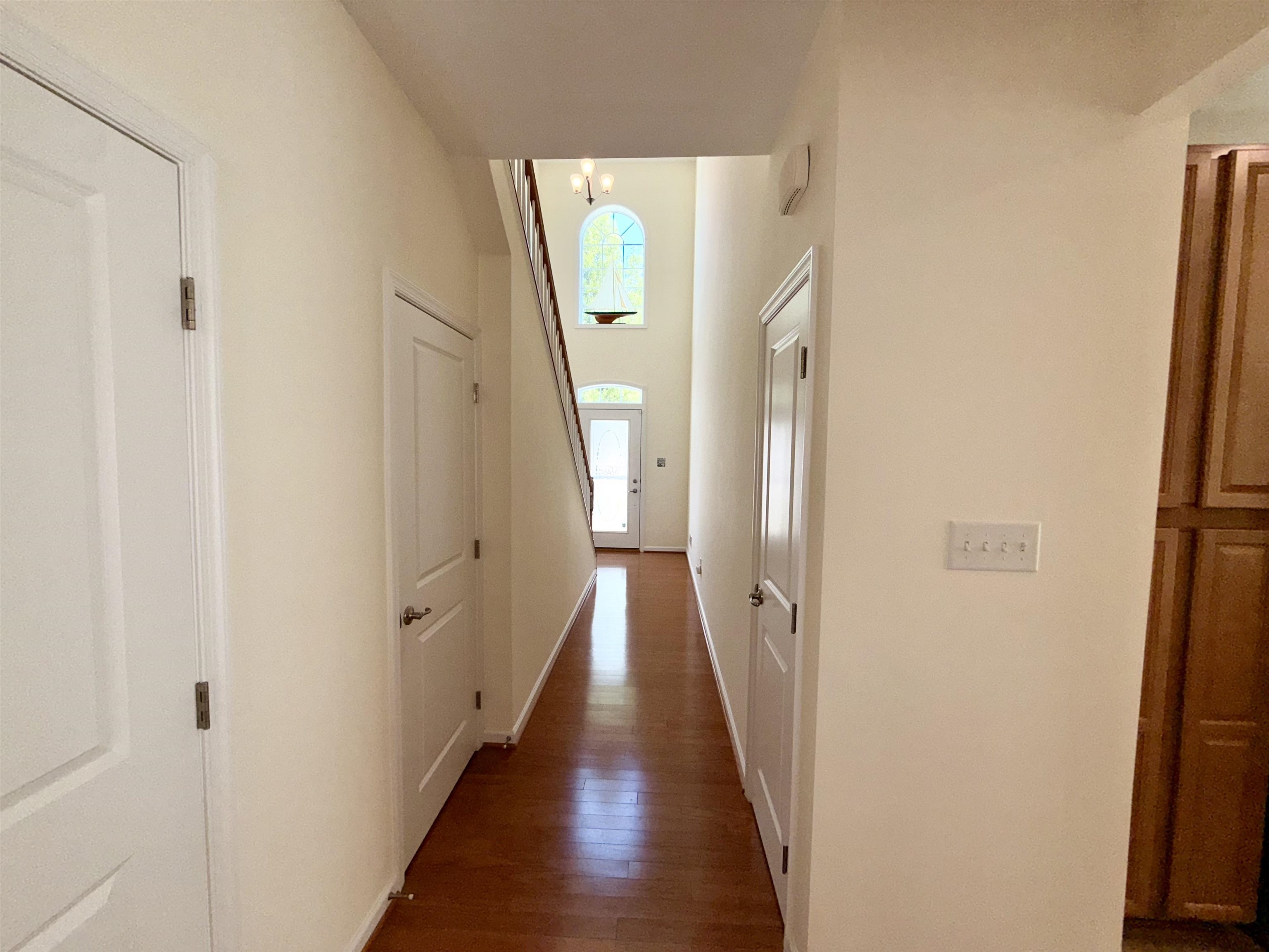 1607 Tidewater Avenue, Unit 1607 Rio Grande, NJ 08242 - Photo 22 of 42 a view of a hallway with wooden floor and staircase