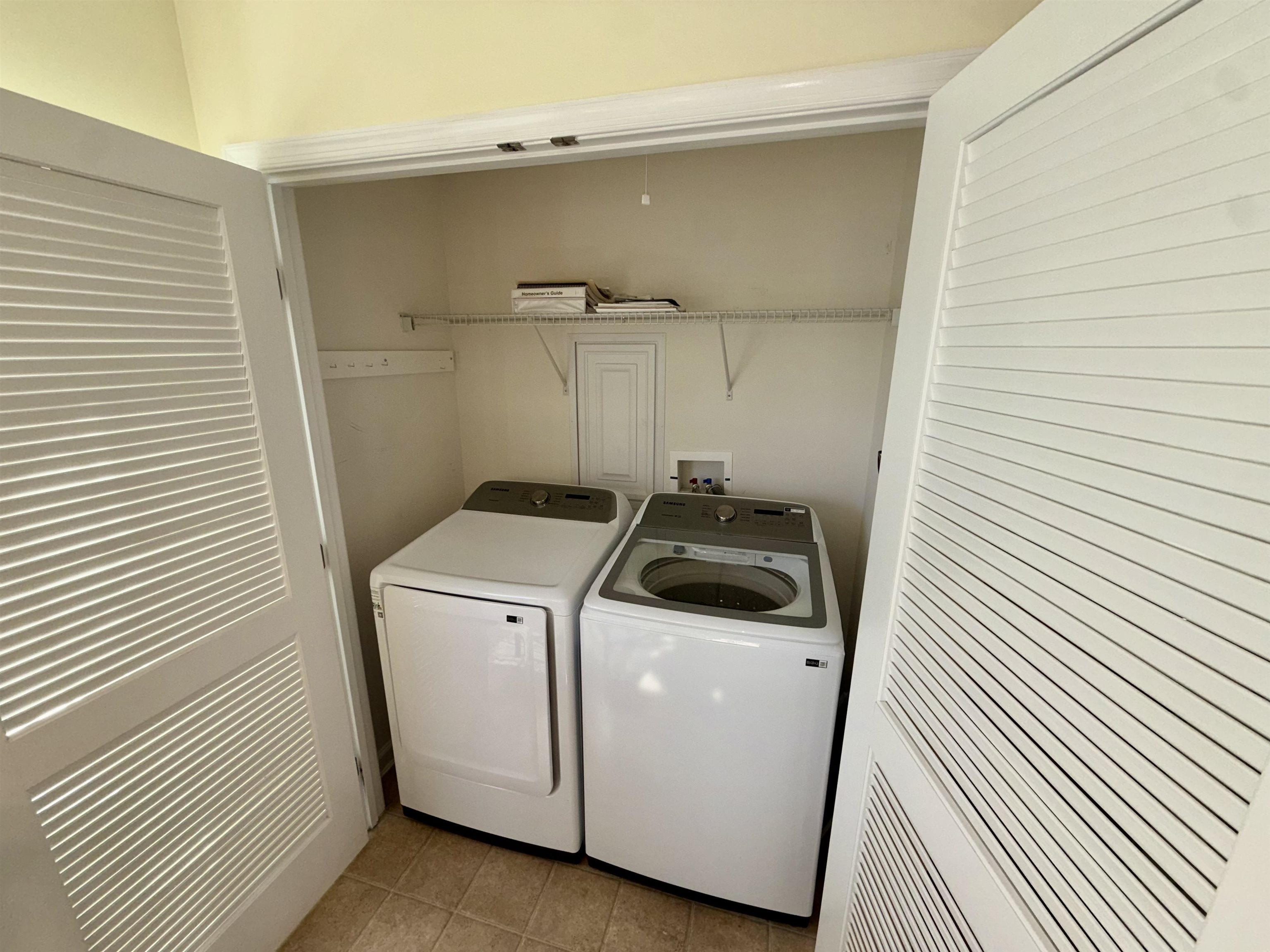 1607 Tidewater Avenue, Unit 1607 Rio Grande, NJ 08242 - Photo 9 of 42 a utility room with dryer and washer