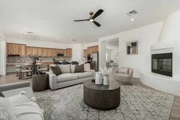 a living room with furniture and a couch