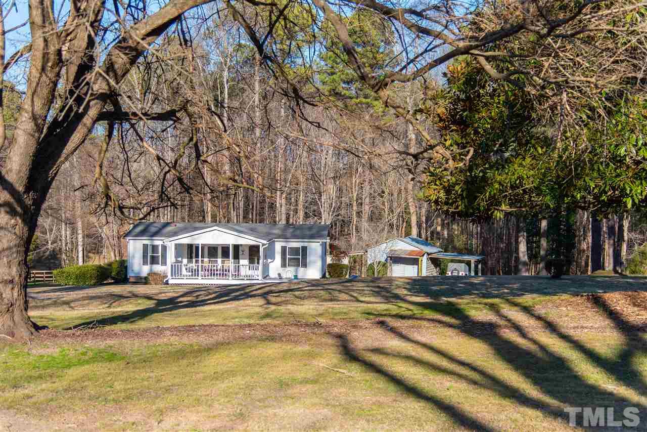 2421 Kearney Road Wake Forest, NC 27587 - Photo 2 of 30 a view of residential houses with yard and swimming pool