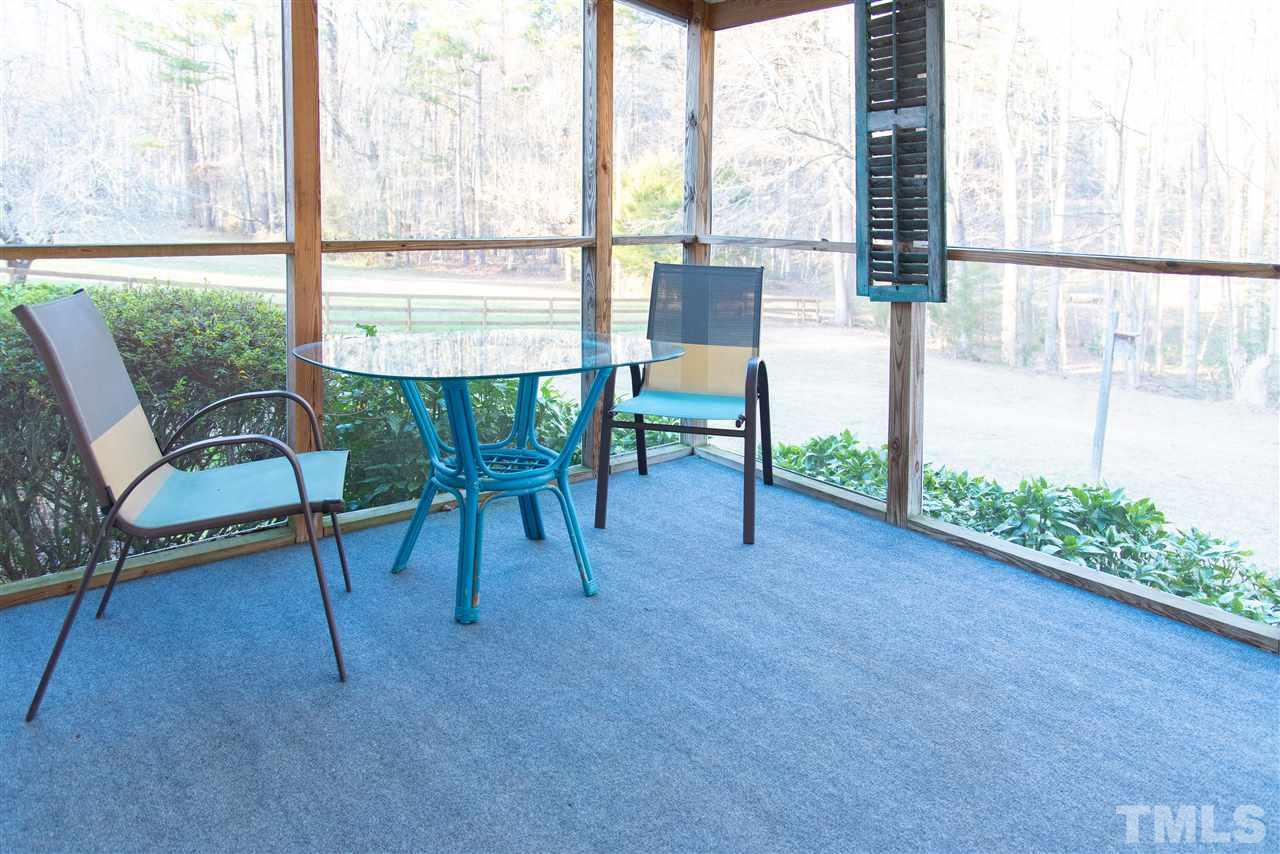 2421 Kearney Road Wake Forest, NC 27587 - Photo 20 of 30 a view of a room with a table and chairs