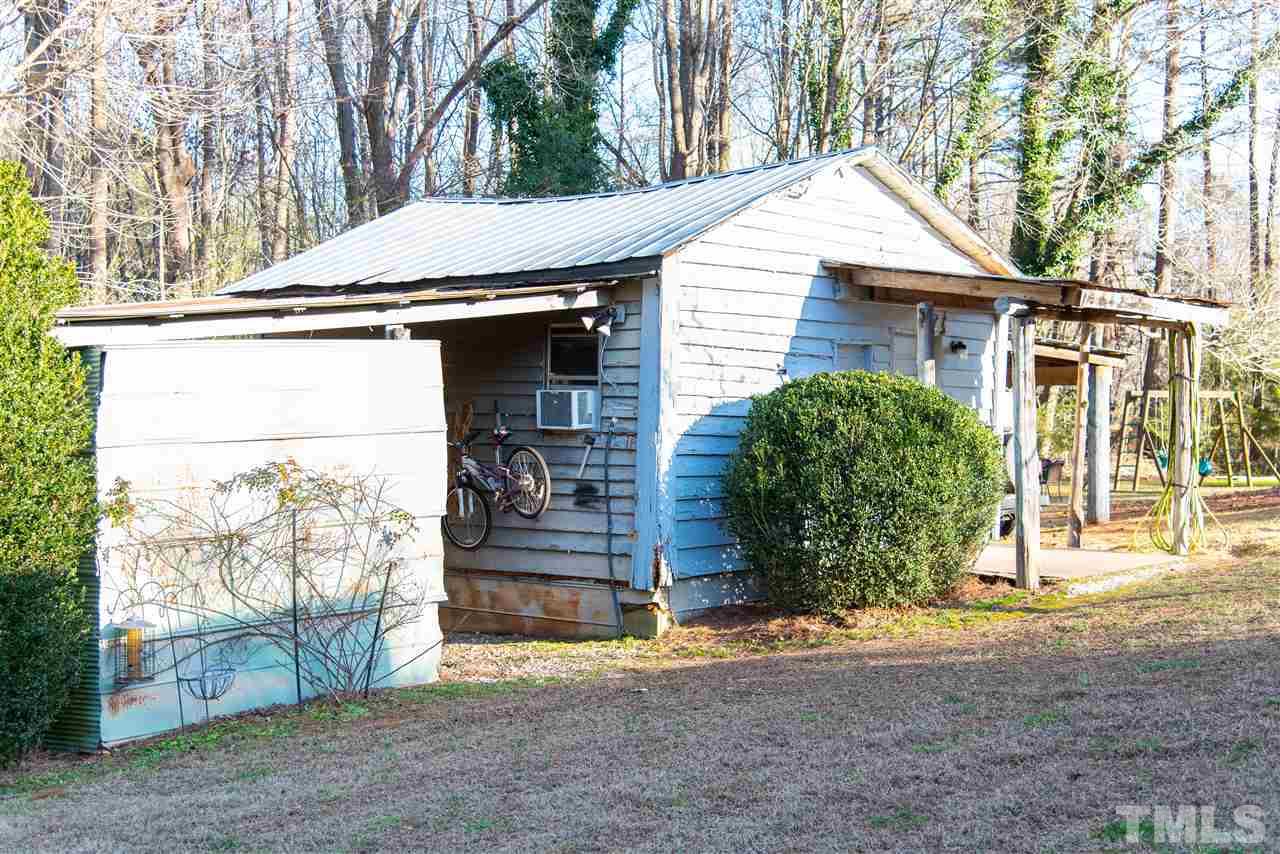 2421 Kearney Road Wake Forest, NC 27587 - Photo 22 of 30 a view of a house with a yard and garage